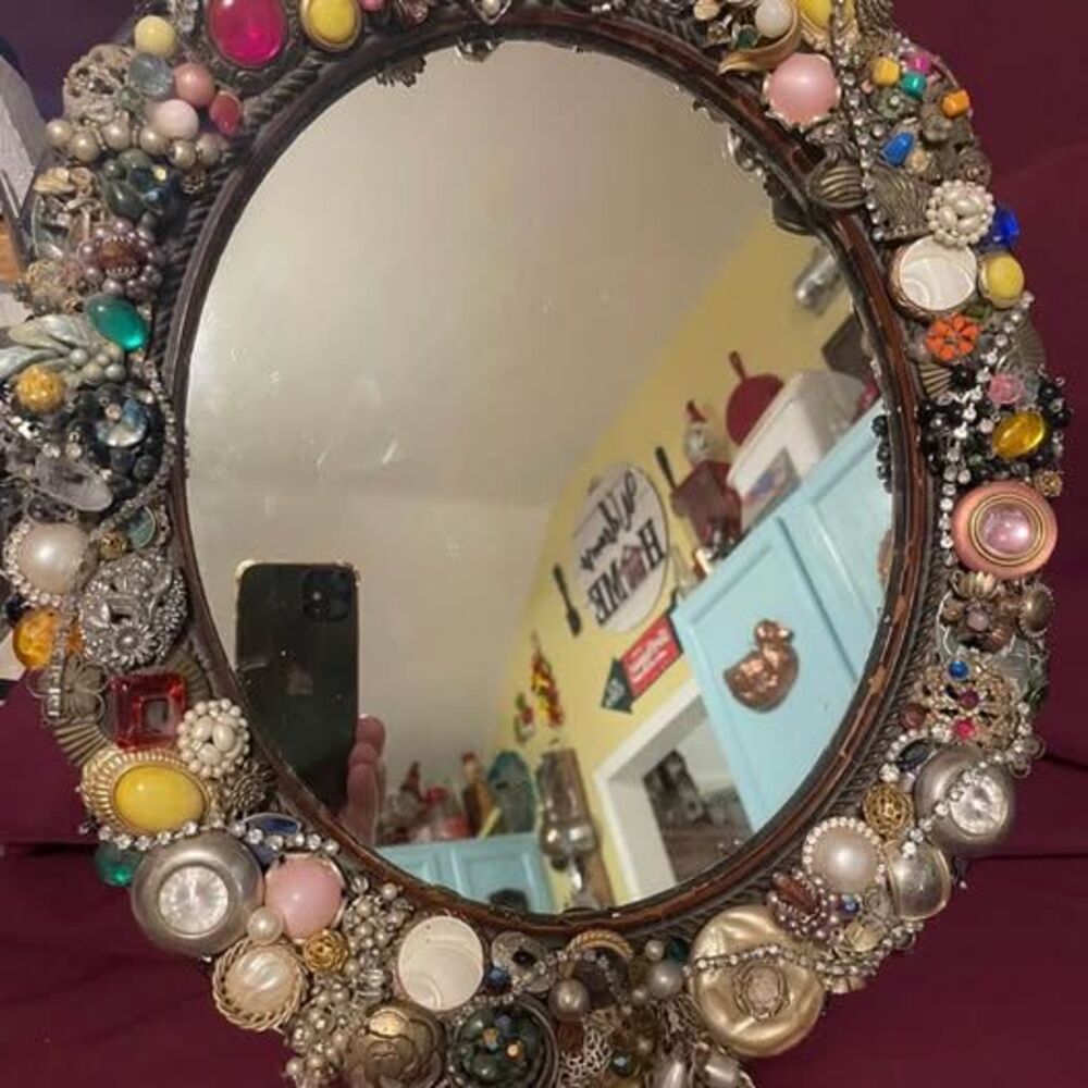 Beautiful vintage button-covered wall mirror